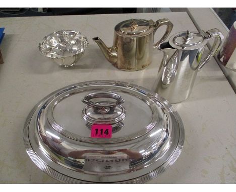 A silver sugar bowl together with a silver plated coffee pot, a teapot, and an entree dish