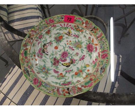 An 18th/19th century Chinese Canton Famille Rose pate decorated in enamel with butterflies representing 'long life', repaired