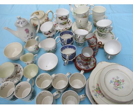 Seven Spode Christmas mugs, an Oriental part coffee set and mixed part teasets to include Colclough