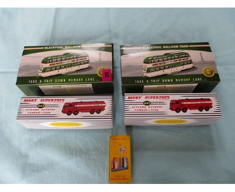 Two modern Dinky Leyland Octopus Esso Tanker Supertoys, a Dinky 'Poste de Ravitaillement' (fuelling pump station), and two At