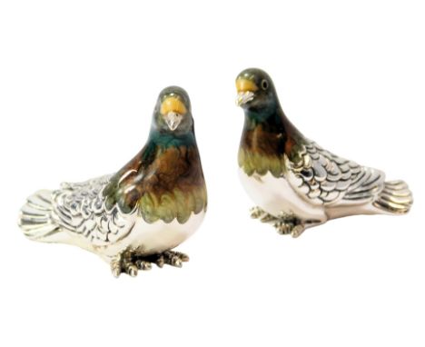 Two silver and enamel figures modelled as birds, each stamped 925, 4cm high and 3.5cm high. 