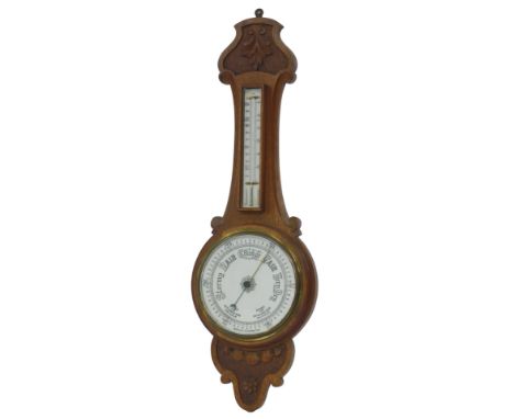 An oak cased banjo aneroid barometer, with white circular enamel dial and mercury measure, the case with carved decoration, 8