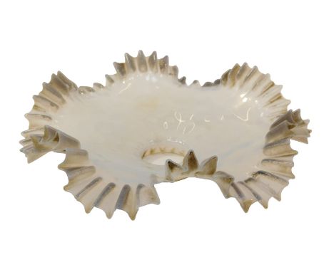 An early 20thC opalescent glass lamp shade, of frilled form, 26cm wide.