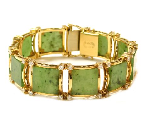 A jade and diamond bracelet, the panel set with square cut jade, round brilliant cut diamonds set over ten sections, yellow m