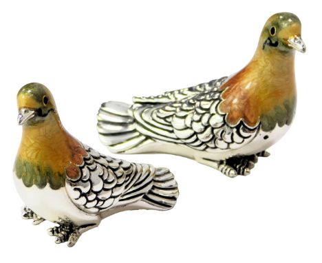 Two silver and enamel figures modelled as birds, each stamped 925, 4cm high and 3.5cm high. 