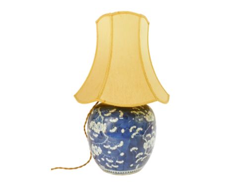 A Qing Dynasty 19thC porcelain blue and white ginger jar, decorated with prunus blossom on a cracked ice ground, converted to