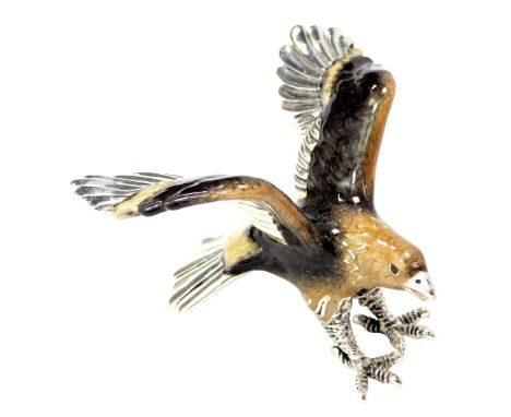 A silver and enamel figure modelled as an eagle, stamped 925, 4cm high. 