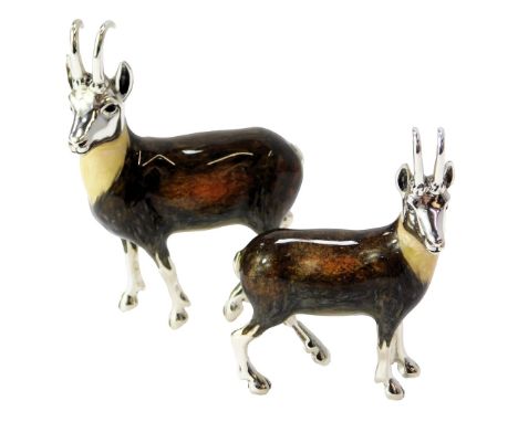 Two silver and enamel figures modelled as chamois, each stamped 925, 8cm high and 6.5cm high. 