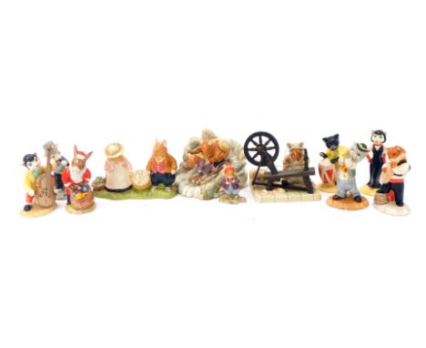 A group of Beswick pottery figures modelled as cats playing musical instruments, comprising Purrfect Pitch, CC1, Rat Catcher 
