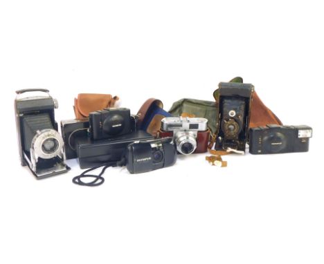 A Voigtlander Vito BL camera, Kodak camera, number 2 folding Autograph Brownie camera, Olympus XA2 camera, boxed, and an A11 