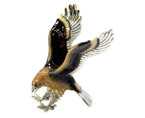 A silver and enamel figure modelled as an eagle, with wings raised, stamped 925, 7cm high. 