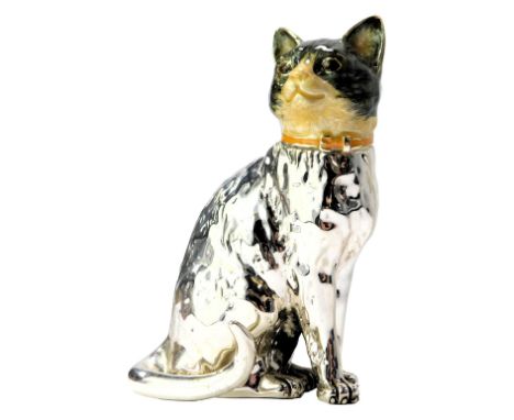 A silver and enamel figure modelled as a seated cat, stamped Italy 925, 11cm high. 