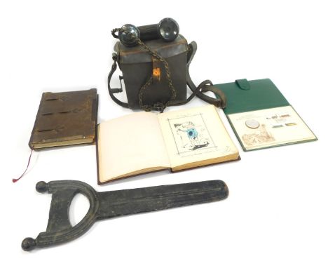 A group of collectables, including an early 20thC album containing various sketches, flower pressing, together with a scrap a