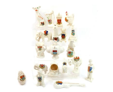 Crested wares, including Lyme Regis Maltese Carafe, 11cm high, Great Yarmouth elephant, 8cm high, Cambridge cat, Felixtowe ha