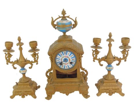 A 19thC French gilt metal and enamelled clock garniture, the white enamel circular dial bearing Roman numerals interspersed w