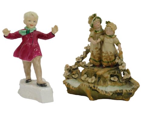 A Royal Worcester porcelain figure modelled as January's Child, 3452, modelled by F G Doughty, 17cm high, together with a 19t