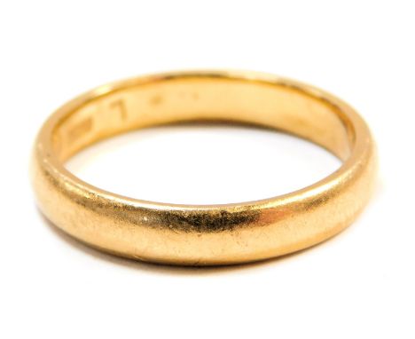 A 22ct gold wedding band, of plain design, maker ACC, Birmingham 1928, ring size K½, 4.2g all in. 
