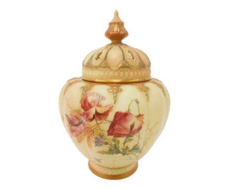 A Royal Worcester blush ivory porcelain vase and cover, the lid with shaped finial and pierced decoration, the body handpaint