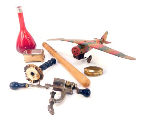 A group of collectables, including a tin plate plane, turned wooden truncheon, 35cm long, ruby coloured glass vase with silve