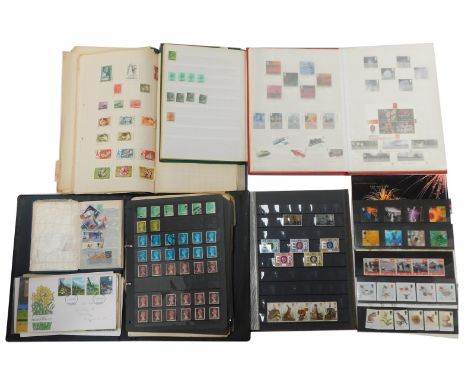 Various stamp albums, GB commemorative, etc. including QEII, Royal Mail Commemorative Millennium stamps, Farmer's Tales, firs