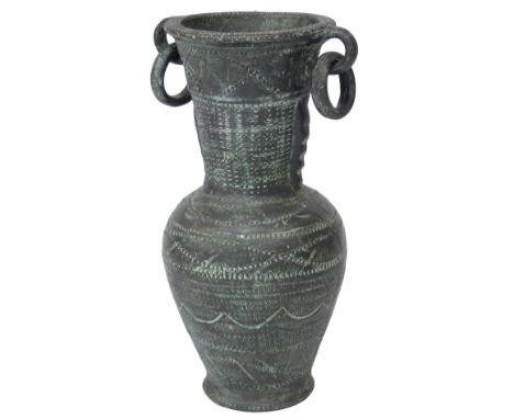 A Spanish bronze glazed terracotta twin handled vase, stamped Made in Spain, 45cm high.