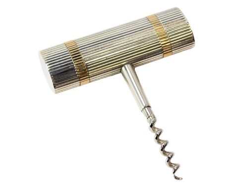 A steel corkscrew, the handle of rectangular compressed barrel form, ribbed decoration and gold coloured banding, stamped Guc