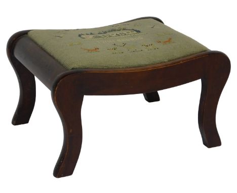 An oak footstool, with woolwork tapestry top, raised on scroll legs, 36cm wide. 