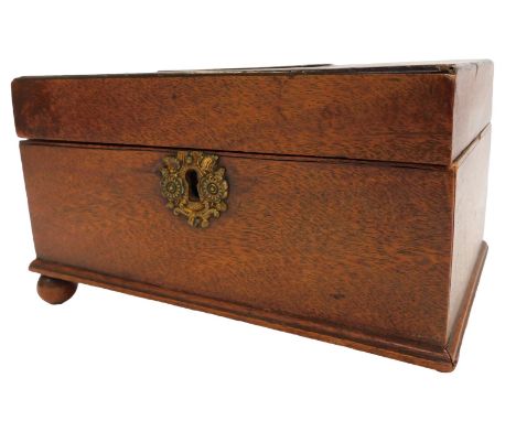 A George III mahogany tea caddy, rectangular section, the hinged lid opening to reveal two lidded compartments, raised on bal