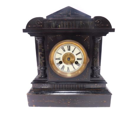 A Victorian mantel clock, the brass dial with cream enamel chapter ring, bearing Roman numerals, eight day, the wooden simula