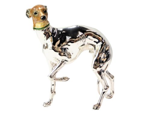A Saturno silver and enamel figure modelled as a Greyhound, with one paw raised, wearing green collar, stamped Saturno Italy 