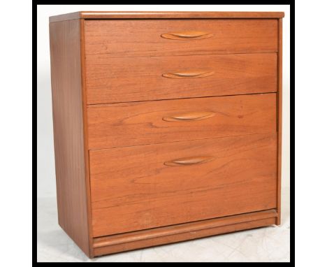 A vintage retro 20th century teak chest of drawers by Austinsuite London. The straight bank of four drawers raised on plinth 