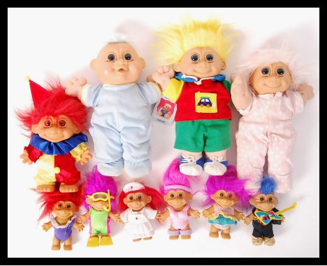 A good collection of vintage retro Troll dolls to include four larger examples and six smaller examples. Some with accessorie