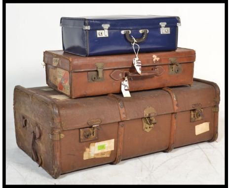 A good stack group of four vintage luggage to include leather suitcases blue leather example etc. Please see images. Measures