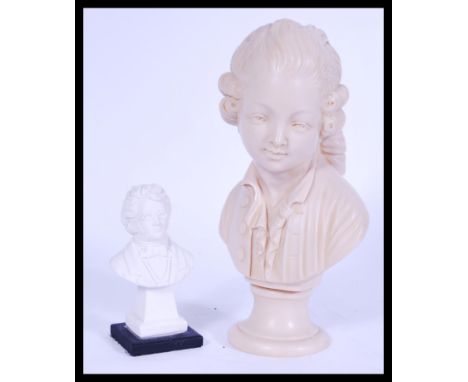 Two vintage 20th century busts one resin and one plaster depicting Mozart and Schubert. Please see images.&nbsp;Measures: 31c