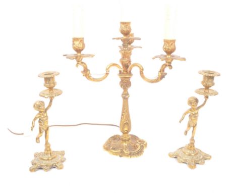 A mid Century circa 1940s brass candelabra lamp having four arms with foliate / acanthus design. Together with pair of brass 