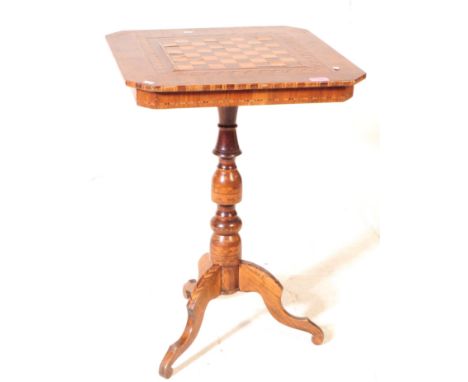 Late 19th century walnut and satinwood Tunbridge inlaid tripod games table, square chessboard top with canted corners on turn