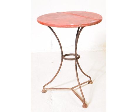 An early 20th century side table. The table having red lacquered circular top over metal tripod base. Measures approx. 63cm x