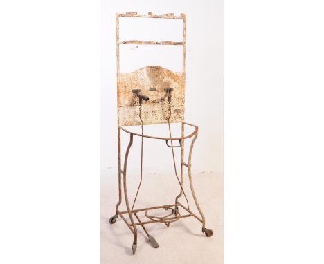 A 20th Century retro industrial painted metal outdoor wash stand. The stand having space for a wash basin with taps above. Ra