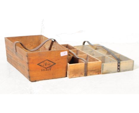 A collection of three vintage wooden trugs, with leather handles, rectangular form with one stamped British produce, grown in