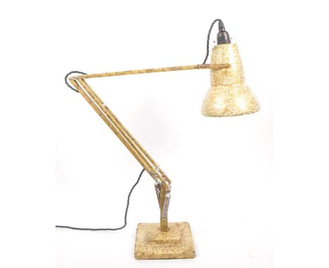 Herbert Terry - A mid 20th century Herbert Terry Model 1227 Anglepoise desk / side lamp. The lamp raised on a gilt scumbled s