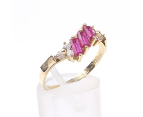 A vintage Continental synthetic-ruby and cubic zirconia cross-over dress ring. The head claw set with three baguette syntheti