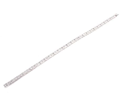 A vintage Chinese-export diamond line bracelet. In the form of 53 round brilliant diamonds approx. 3.18cts total, grain set i