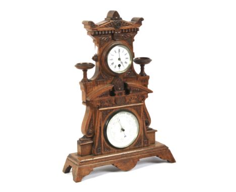 Victorian oak baroque revival mantle clock/barometer. With decorative carved pediment above an enamel dial with Roman numeral