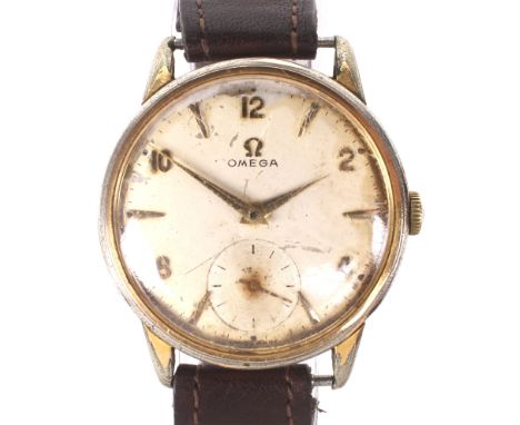 A vintage gentleman's Omega manual wind wristwatch. The dial with alternating baton and Arabic numerals denoting hours, secon