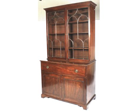 Georgian mahogany secretaire bookcase. The astragal glazed, doors enclosing four shelves, the secretaire fall front revealing