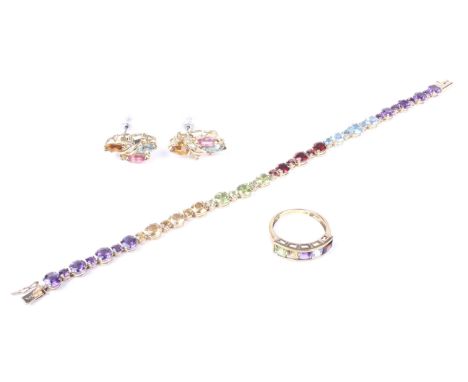 A modern QVC 9ct gold and multi-gem line bracelet, a ring and a pair of earrings; The bracelet set with various graduated ame