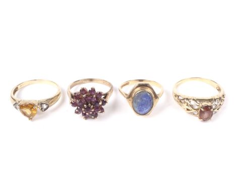 Four vintage and modern gold and gem set rings. Comprising; a 9ct gold and oval opal-triplet dress ring of hexagonal outline,