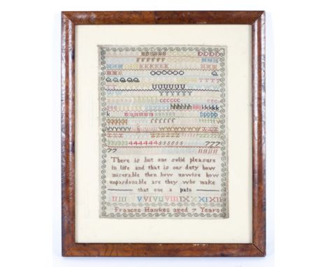 A 19th century needlework sampler. Worked by Frances Hawkes, aged 7 years, with the alphabet, Roman numerals and a verse 'The