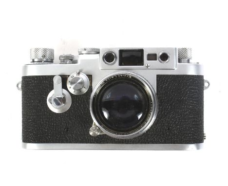 An Ernst Leitz Wetzlar Leica III G 35mm rangefinder camera Nr. 988240, with a Summitar f=5cm 1:2 lens No. 725011, a Summaron 