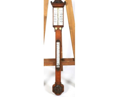 A mid 19th century oak stick barometer. By Boxwell Brighton, the upper section inscribed 10.am yesterday and 10am today, with